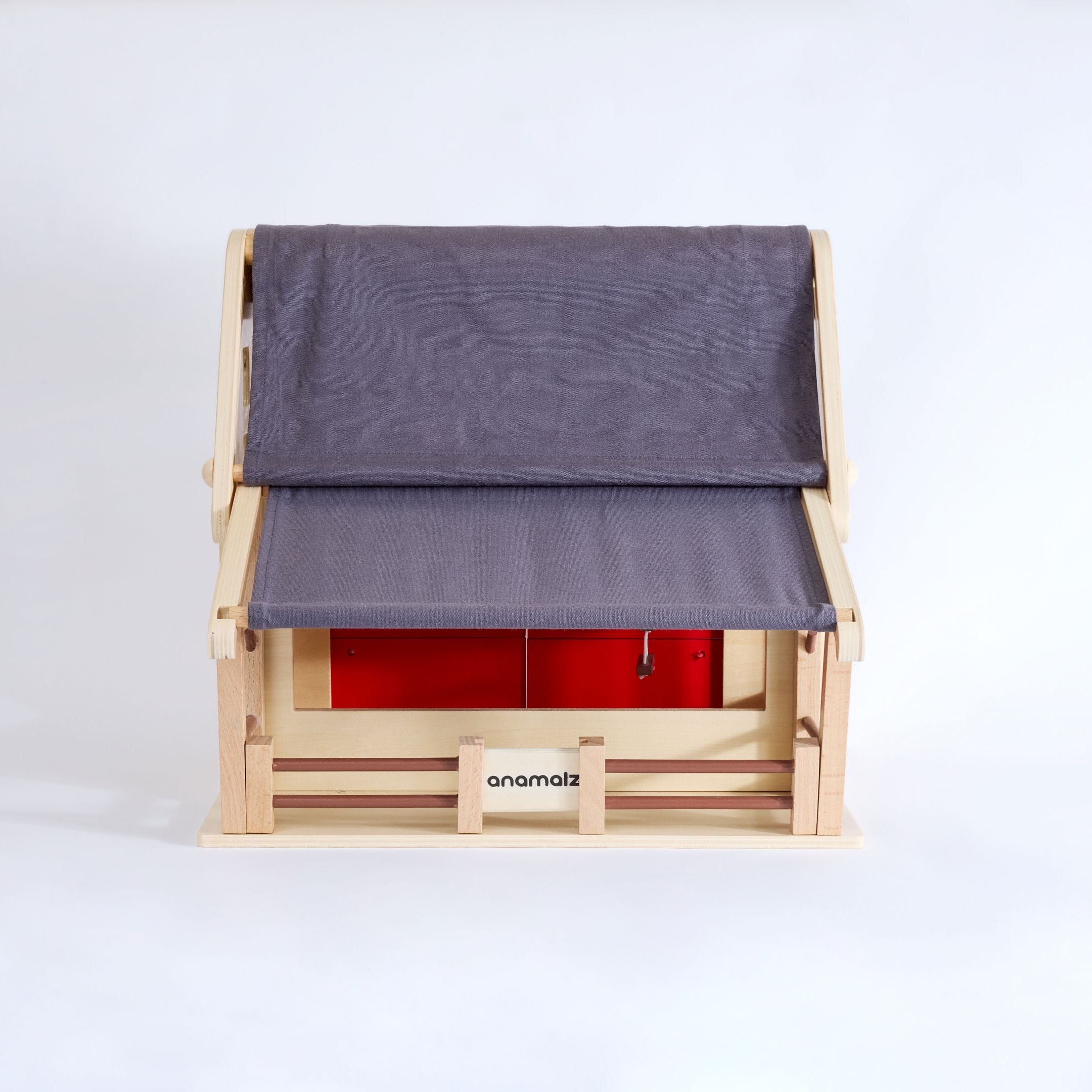 Sustainable toy barnhouse paired with Anamalz farm animal toys – ideal for creative play