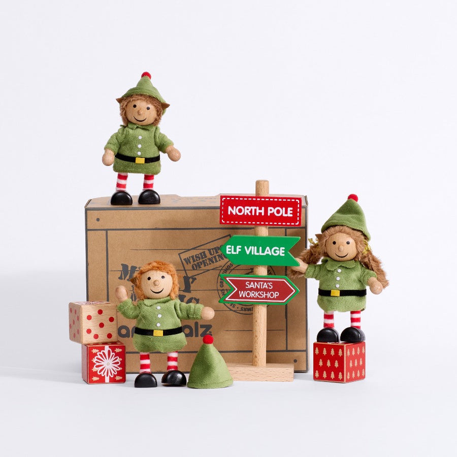 Three Cheeky Elves with their Christmas direction sign, wooden present blocks and gift box
