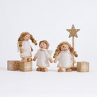 Cherub Angels play scene with three angels, star stand and present blocks on a grey background