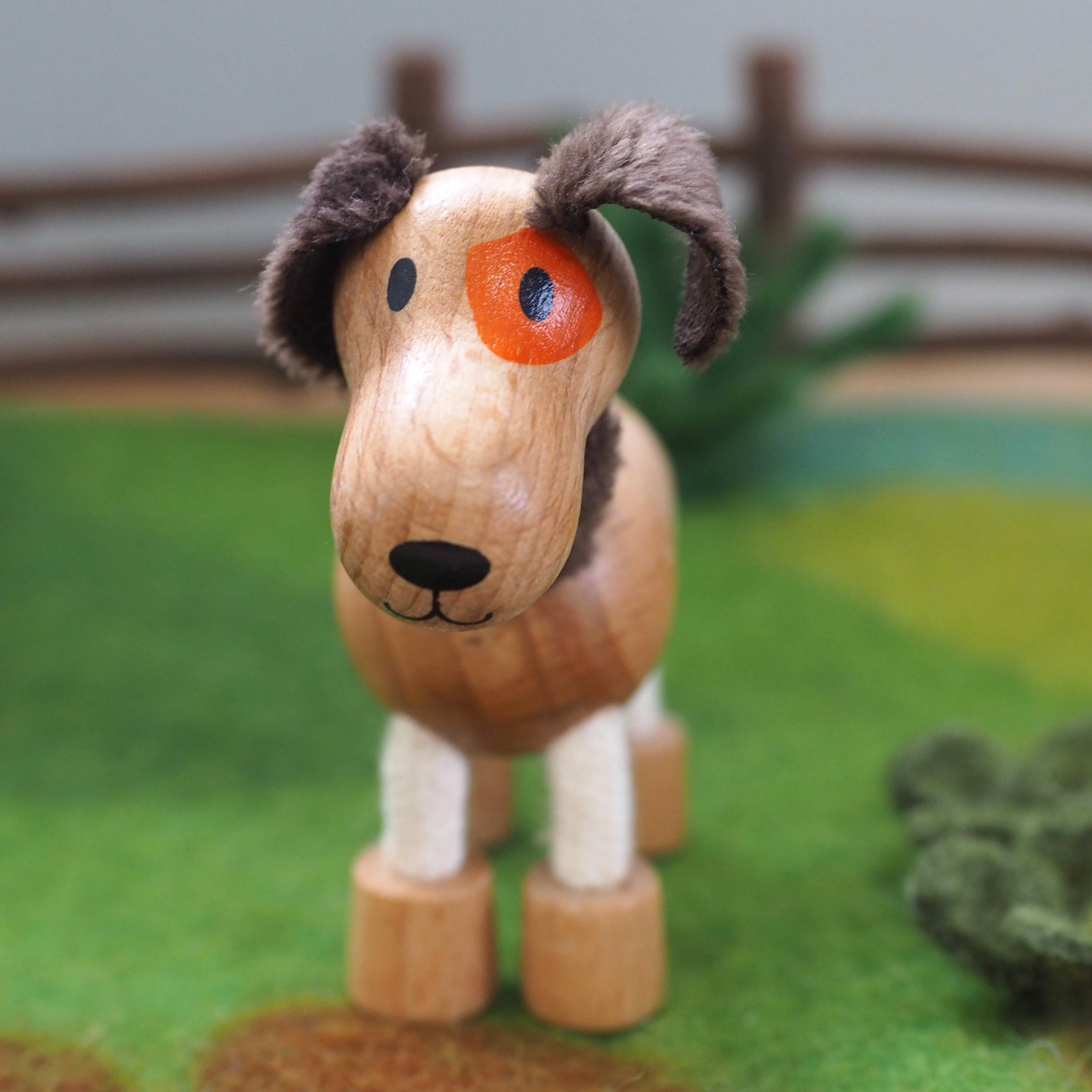 Sensory toy for toddlers – flexible wooden dog with fabric ears