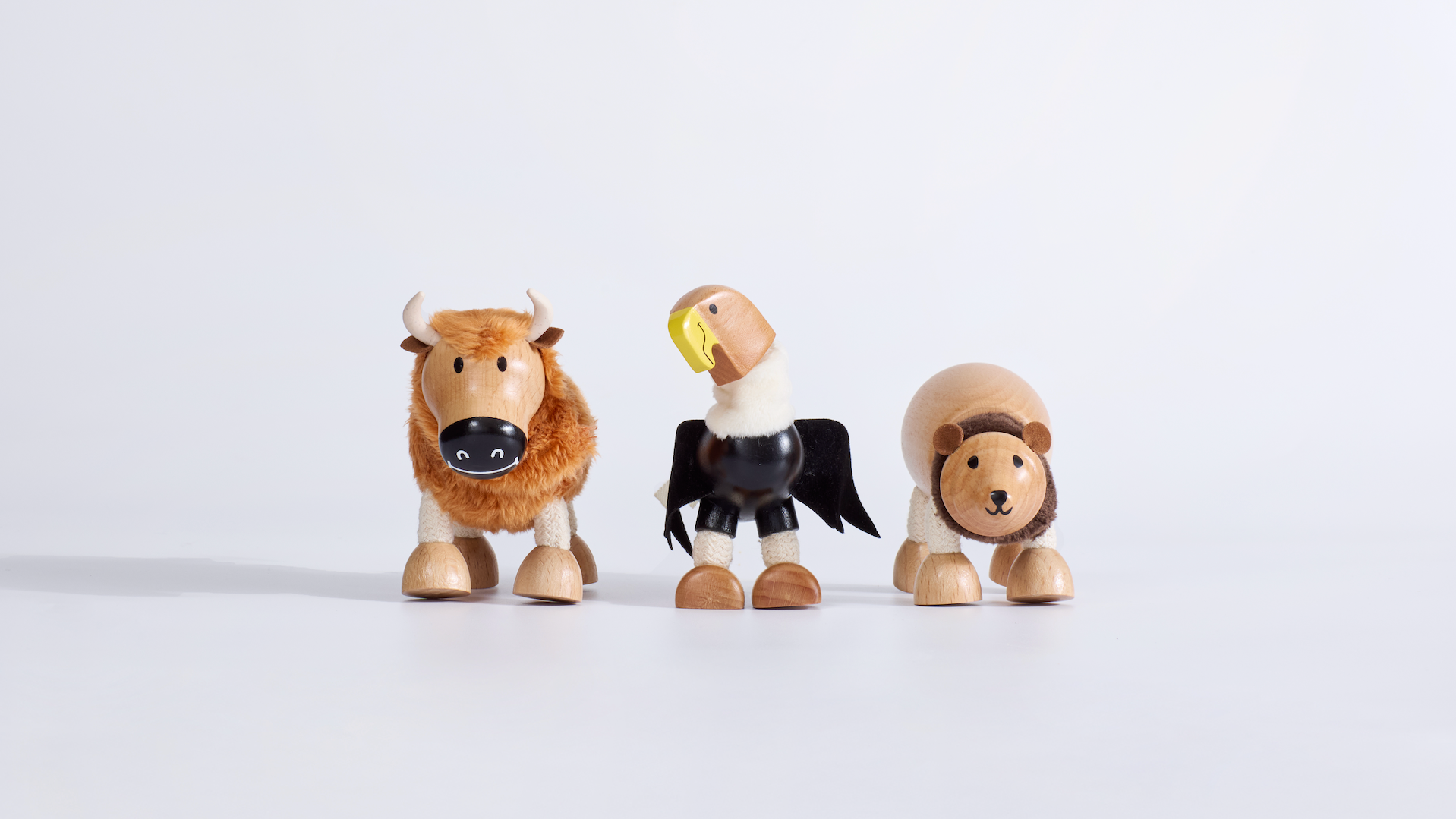 Three usa animal iconic figurines on a white background