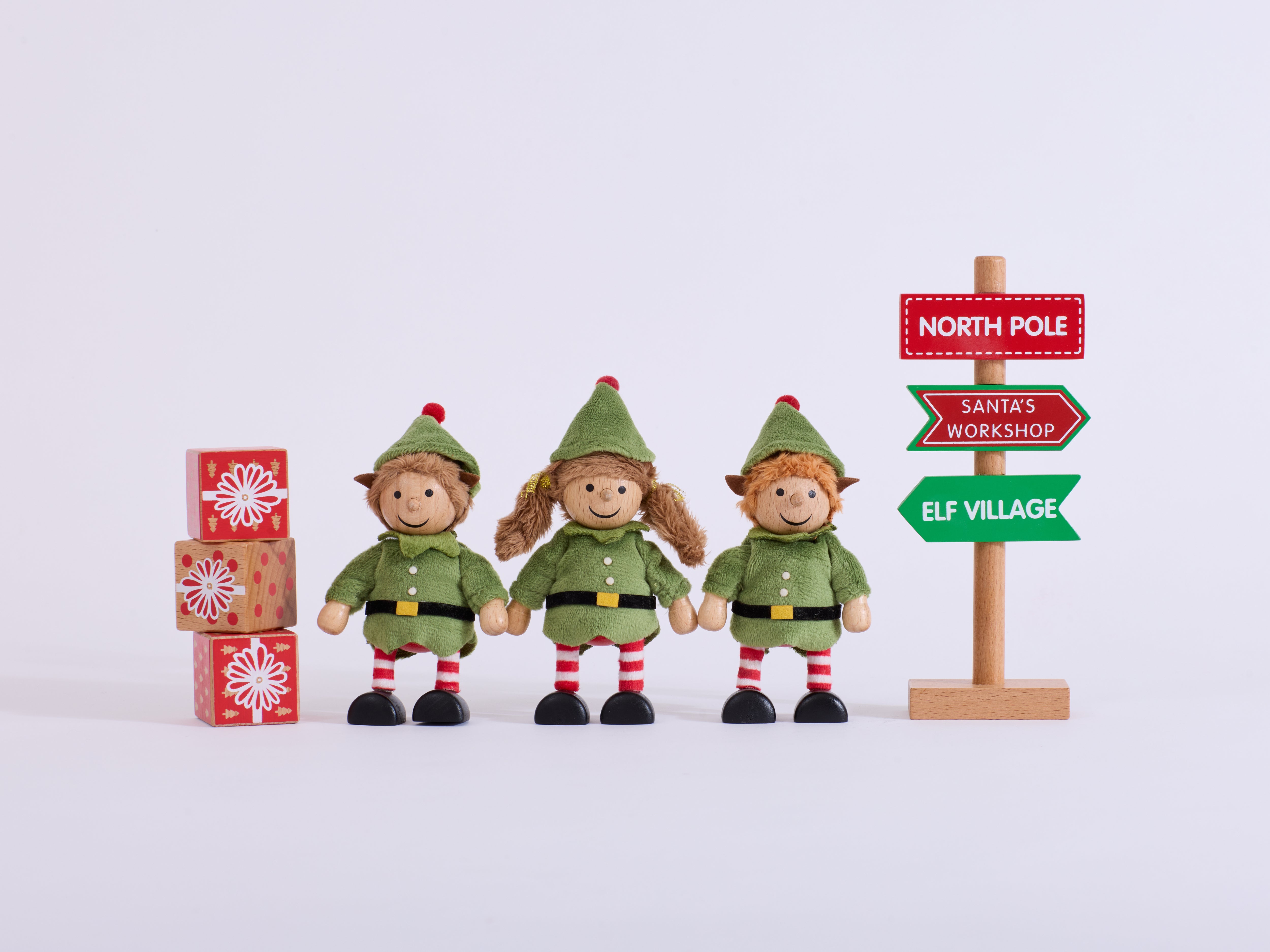 Cheeky Elves Christmas set with three elves, three present blocks and a North Pole sign