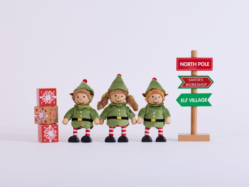 Cheeky Elves Christmas set with three elves, three present blocks and a North Pole sign