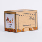 Closed Harvest Mini Crate box with turkey, pumpkin and fox product label and orange autumn leaves