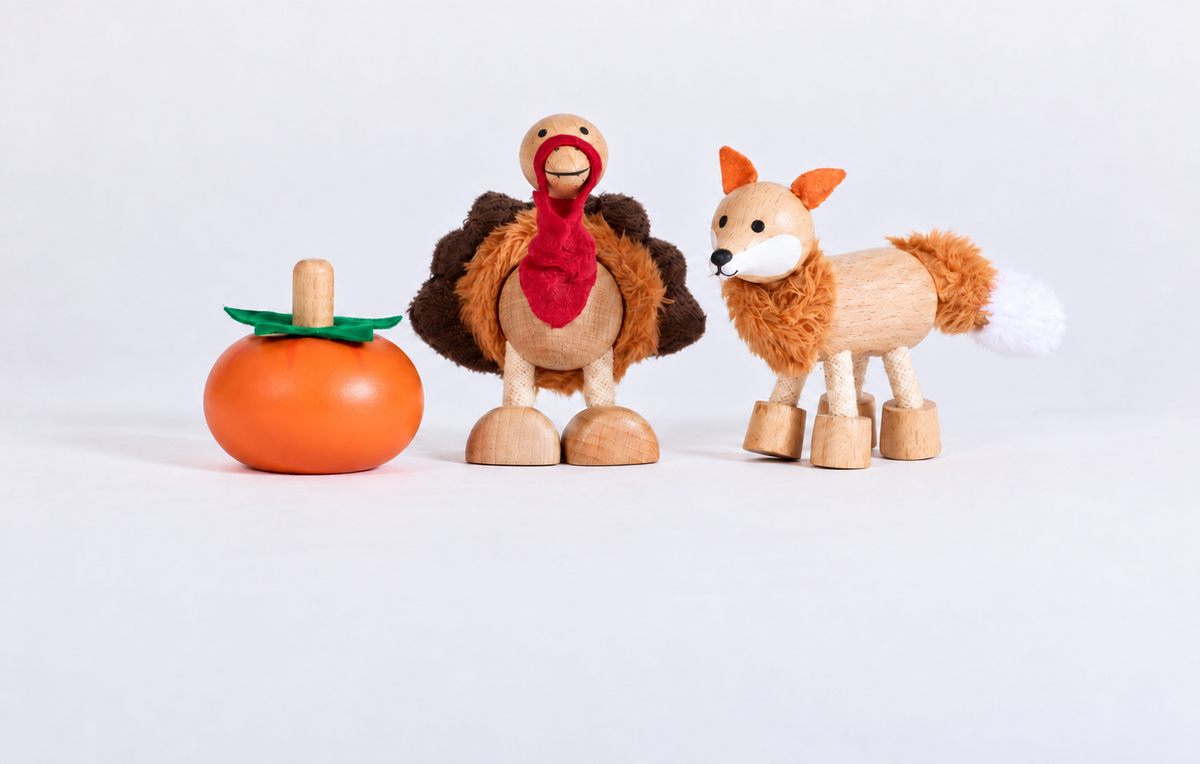 A fox, a turkey and a pumpkin.