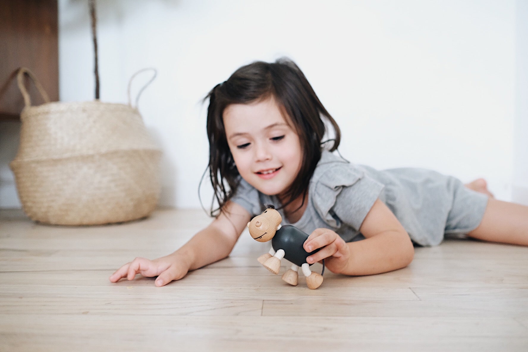 Adorable eco-friendly wooden hippopotamus toy with a playful demeanor, perfect for imaginative play and fun.