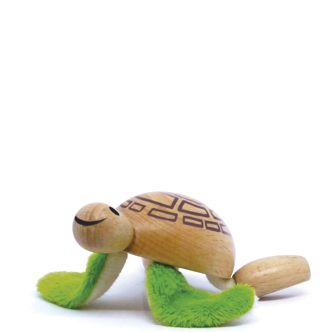 Adorable eco-friendly wooden turtle toy with fabric flippers and a smiling face, perfect for imaginative play and learning.